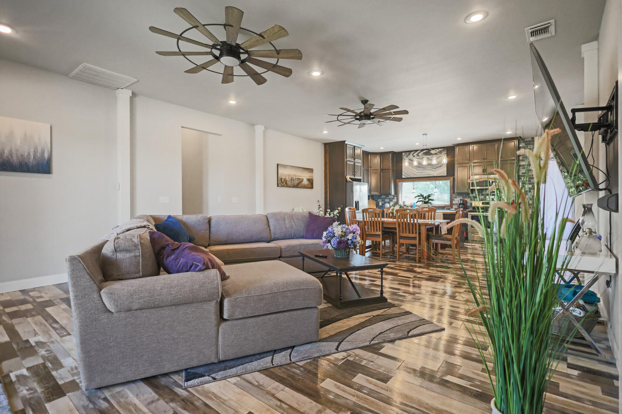301 Fagan Road Snyder, TX 79549 - Photo 21 of 102 a living room with furniture a chandelier and a rug