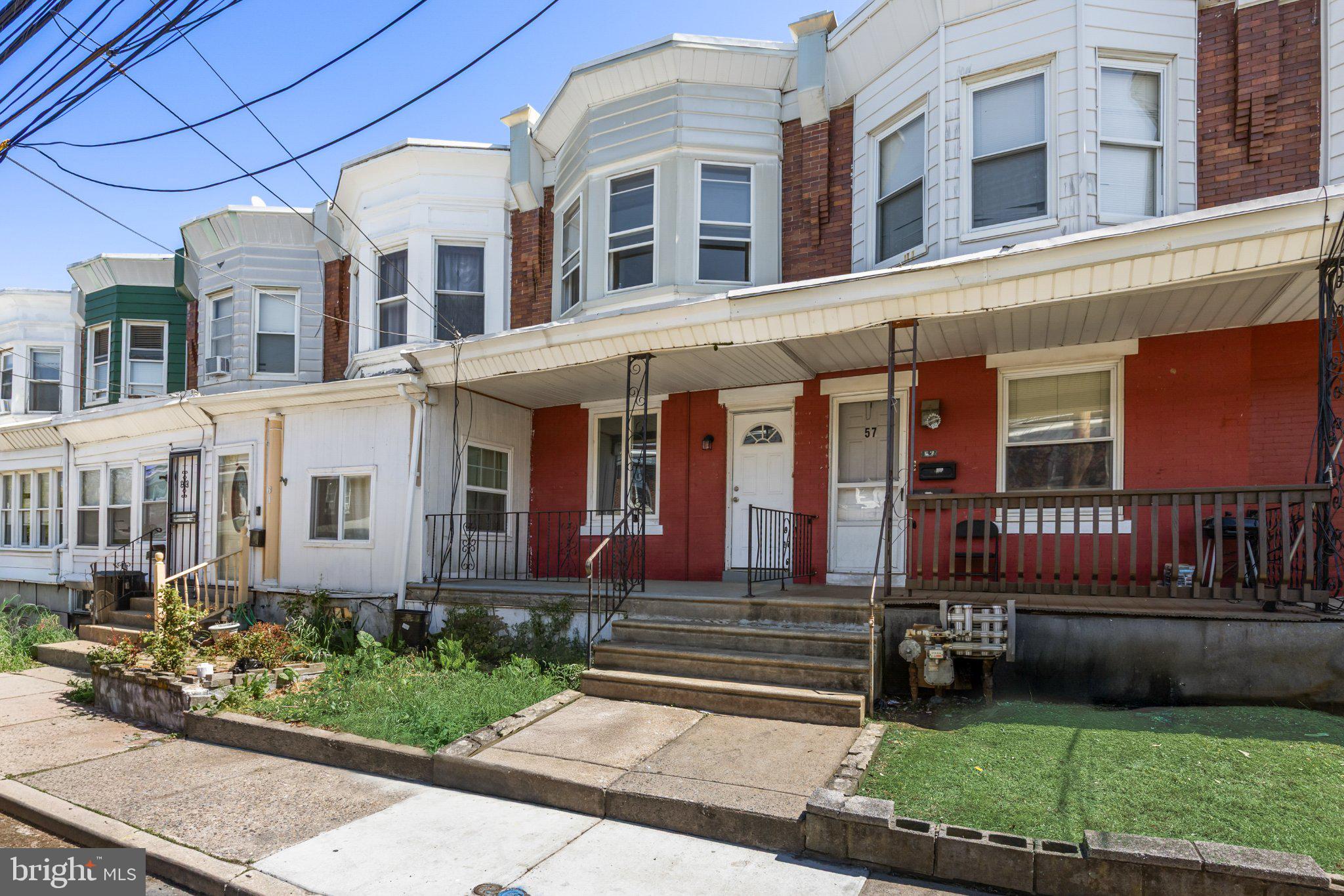 59 North Keystone Avenue Upper Darby, PA 19082 - Photo 3 of 27 Charming row homes with vibrant facades.