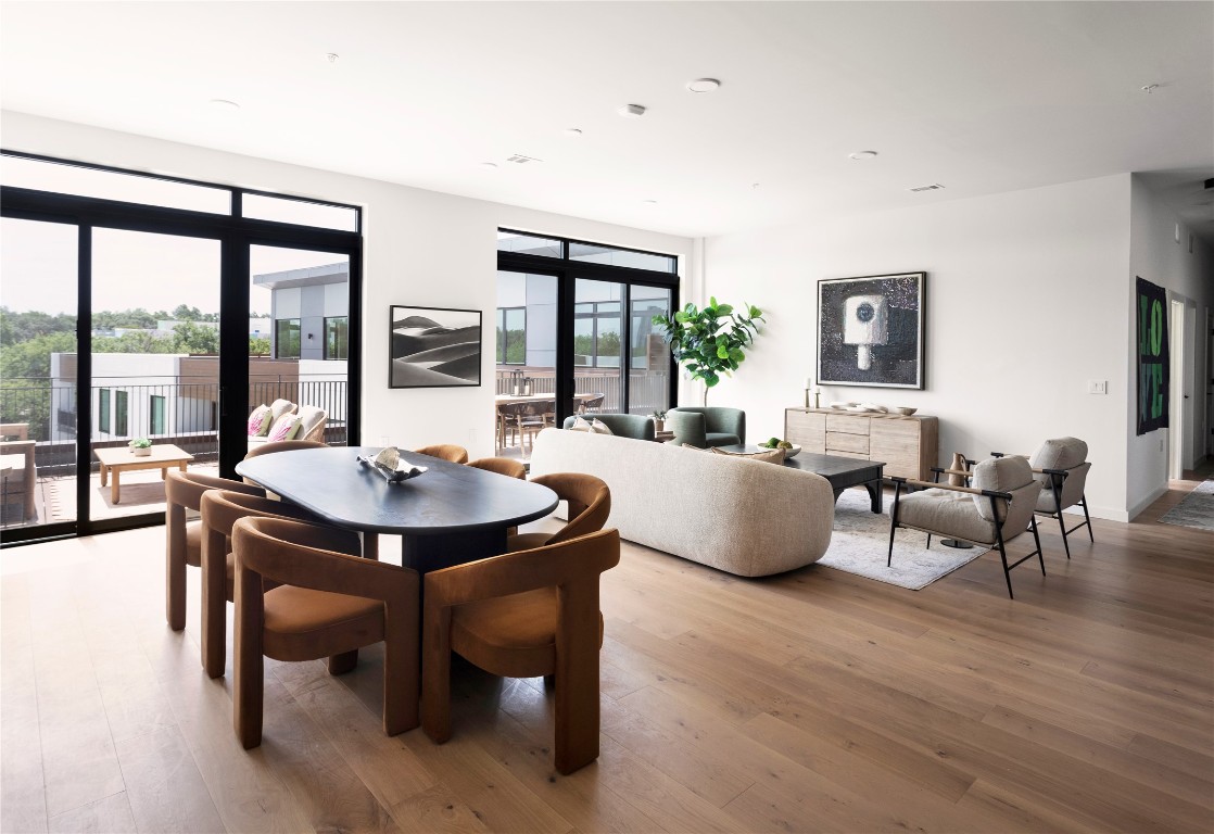 2209 South 1st Street, Unit 408 Austin, TX 78704 - Photo 2 of 28 a living room with furniture and a large window