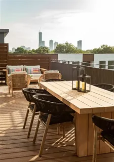 a view of a terrace with seating area