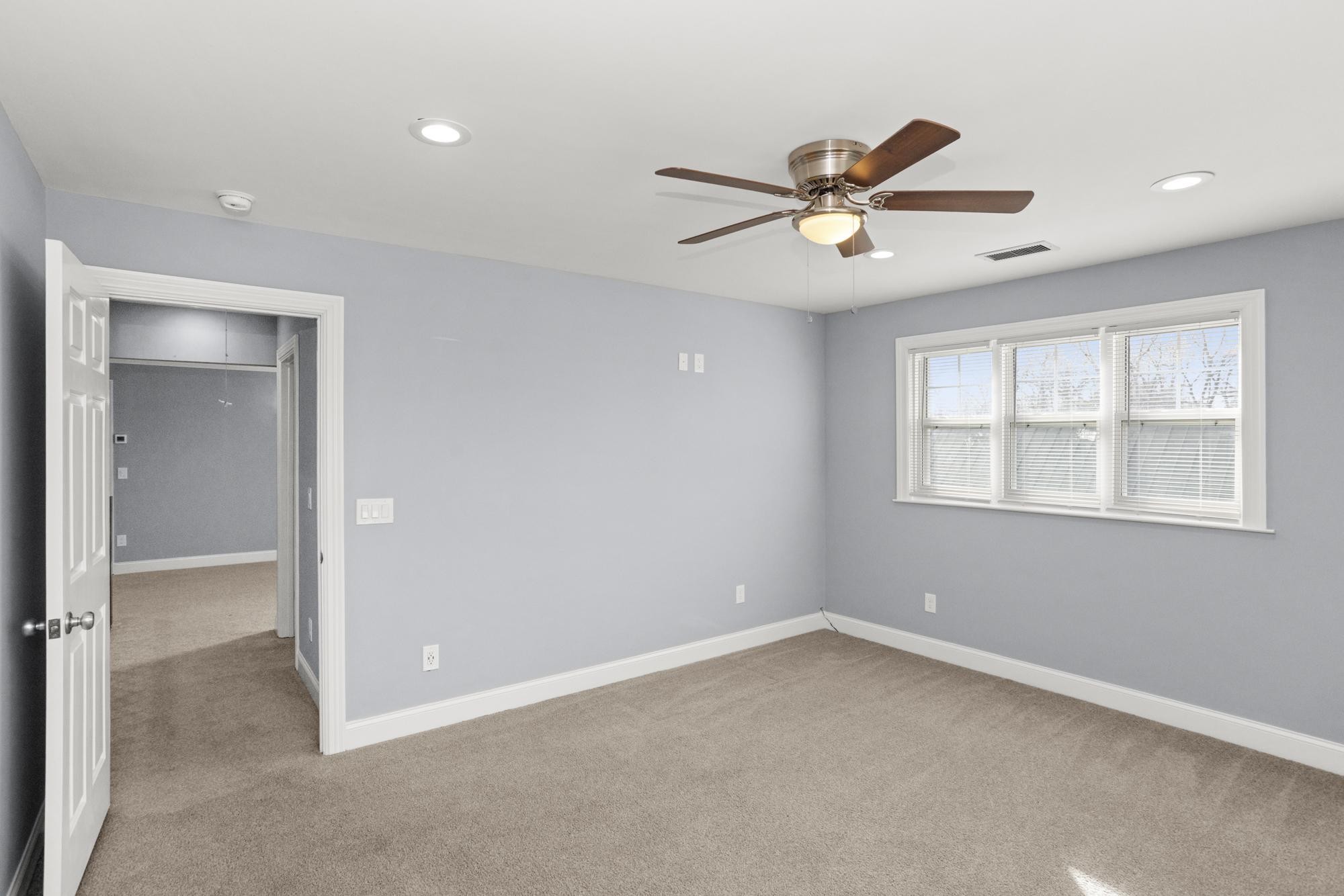 239 East Bledsoe Street Gallatin, TN 37066 - Photo 34 of 52 wooden floor in an empty room with a window