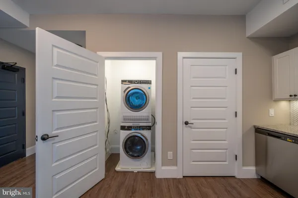 a view of a storage & utility room with washer and dryer