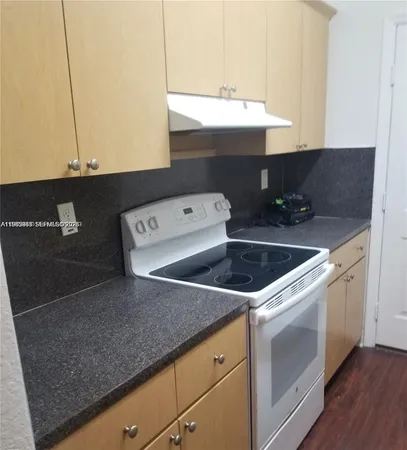 a utility room with washer and dryer