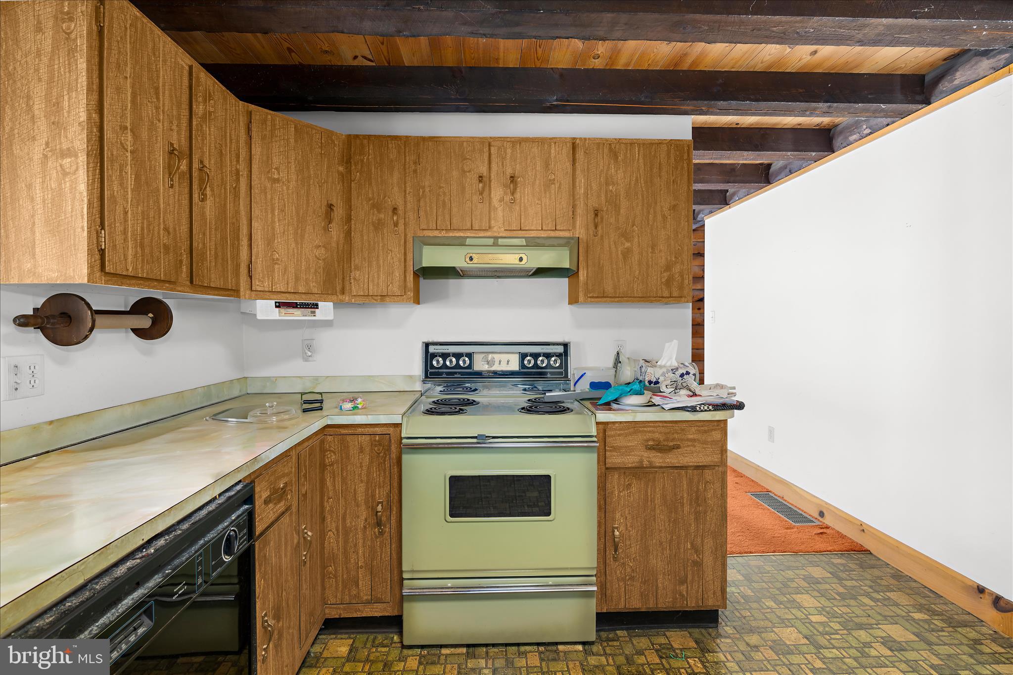 974 Telegraph Road Rising Sun, MD 21911 - Photo 17 of 61 a kitchen with a stove and a microwave