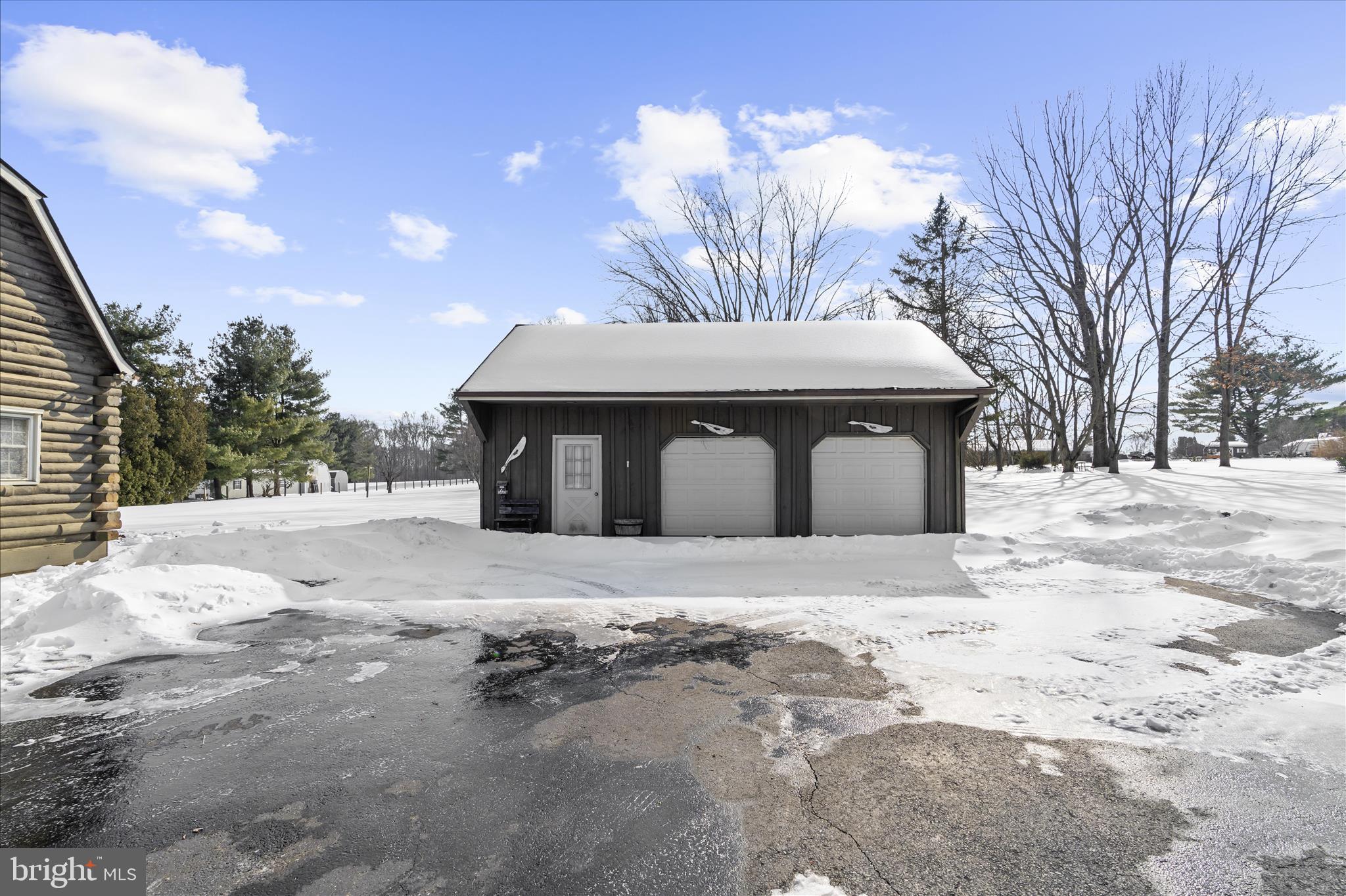 974 Telegraph Road Rising Sun, MD 21911 - Photo 42 of 61 a front view of a house with a yard covered with snow