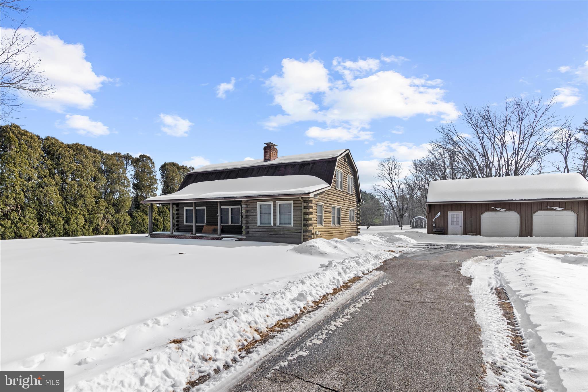 974 Telegraph Road Rising Sun, MD 21911 - Photo 5 of 61 a view of a house with a yard covered in snow