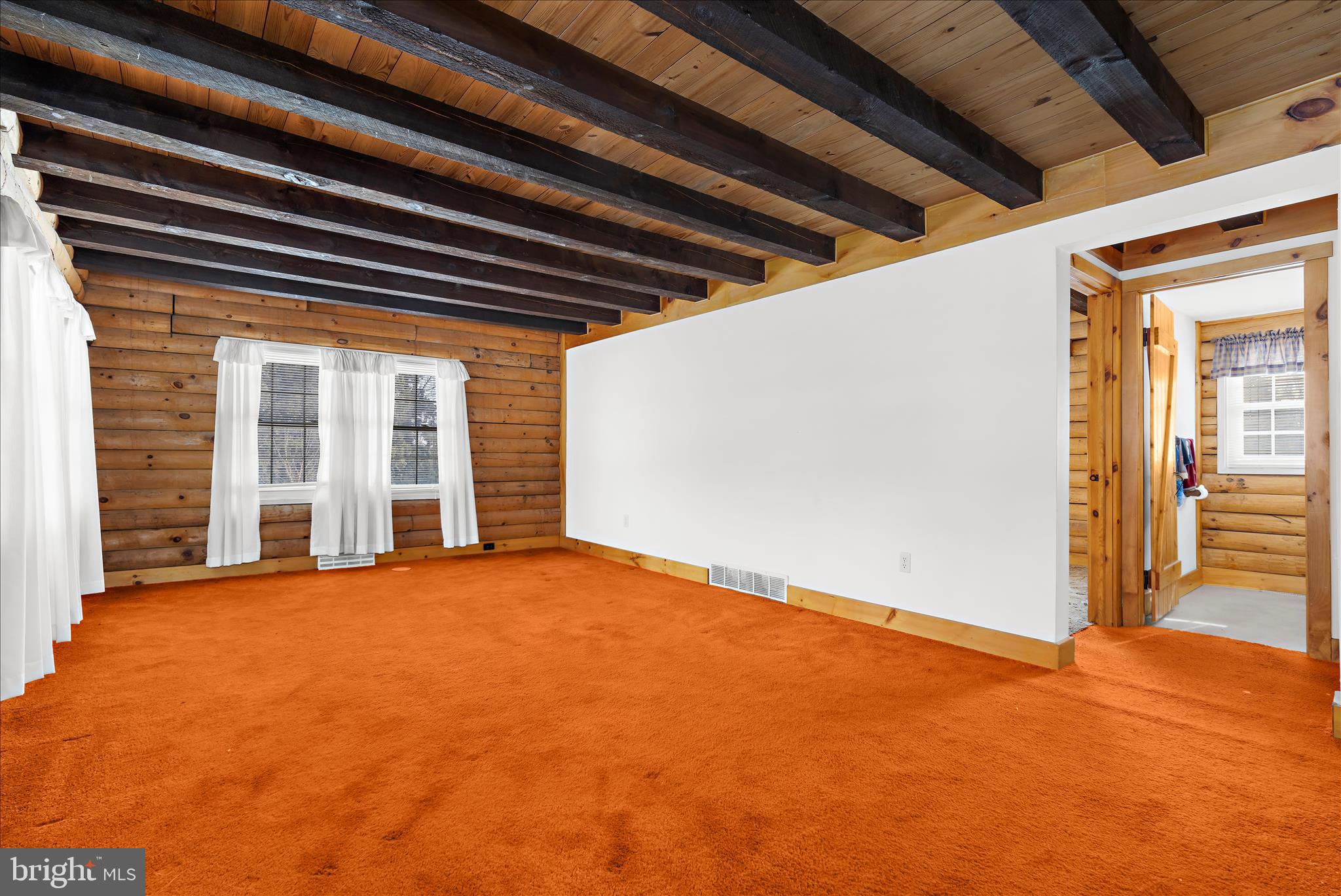 974 Telegraph Road Rising Sun, MD 21911 - Photo 7 of 61 a view of an empty room with wooden floor and a window