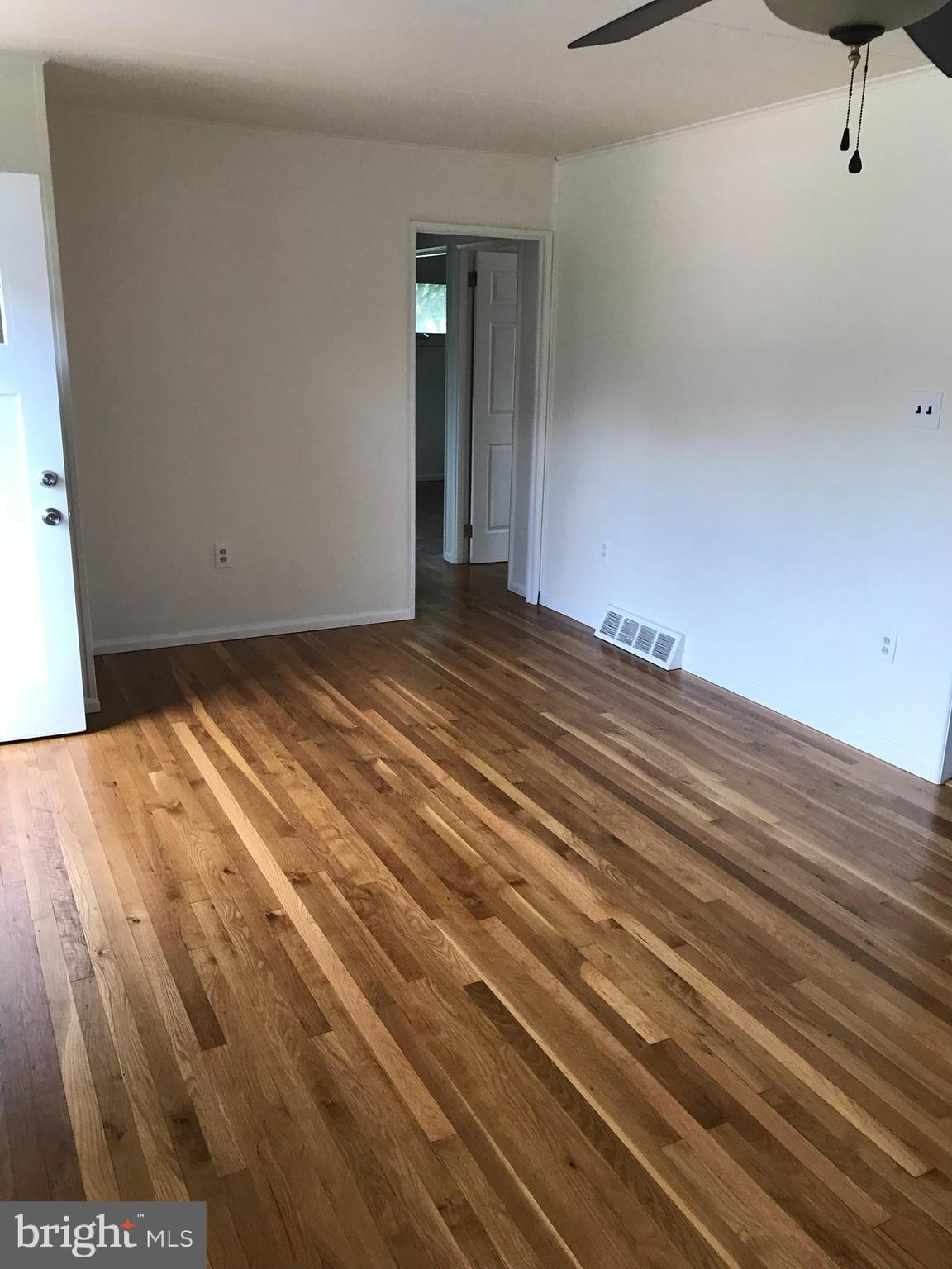46 East Lemon Street Lititz, PA 17543 - Photo 3 of 8 a view of empty room with wooden floor