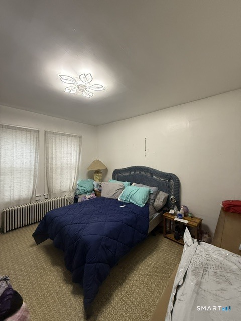 60 Capitol Avenue Meriden, CT 06451 - Photo 14 of 30 a bedroom with bed and a window