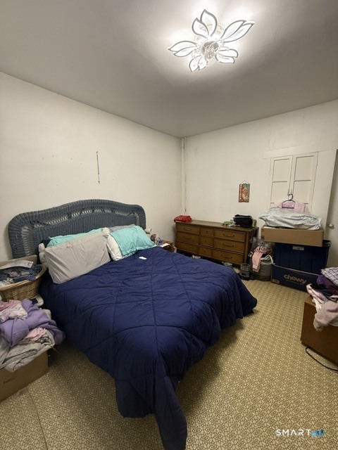60 Capitol Avenue Meriden, CT 06451 - Photo 15 of 30 a bedroom with bed and window