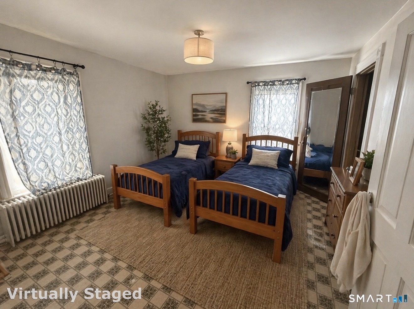 60 Capitol Avenue Meriden, CT 06451 - Photo 19 of 30 a bedroom with furniture and a window