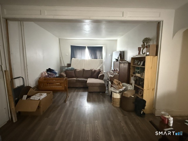 60 Capitol Avenue Meriden, CT 06451 - Photo 5 of 30 a living room with furniture and a wooden floor