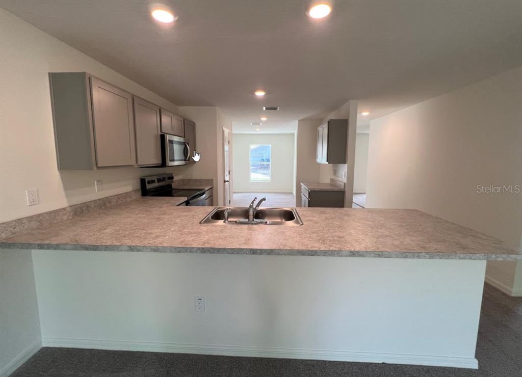 25 Ryding Lane Palm Coast, FL 32164 - Photo 4 of 13 Gallery Image 4
