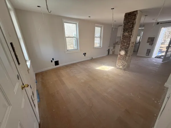 an empty room with windows