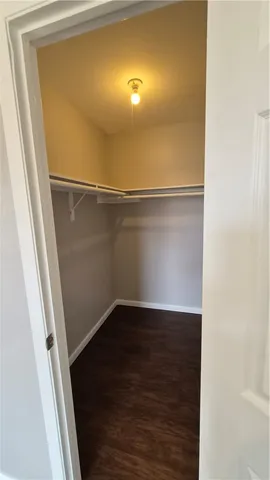 a view of small yard with wooden fence