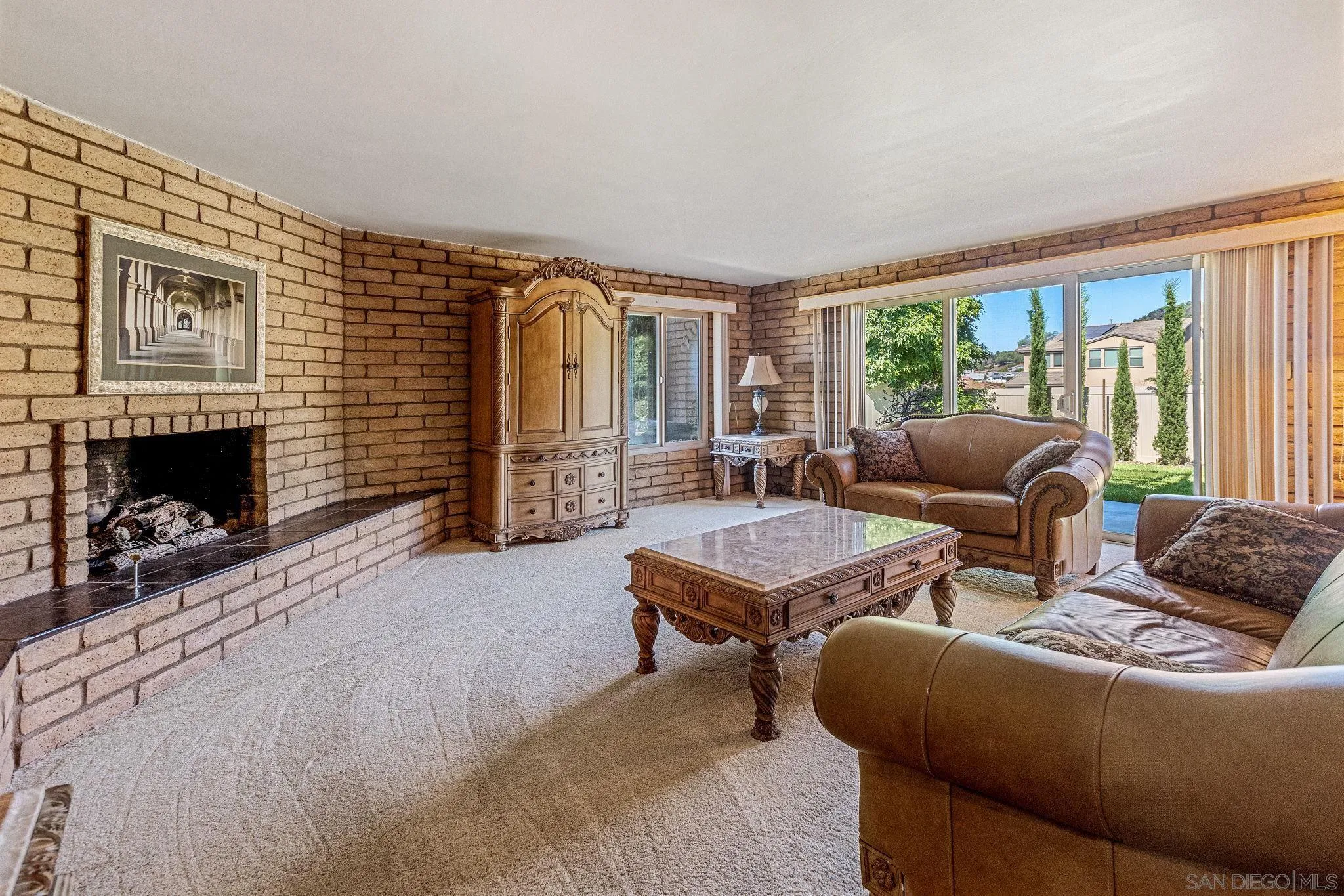 1983 David Drive Escondido, CA 92026 - Photo 23 of 55 a living room with furniture fireplace and flat screen tv
