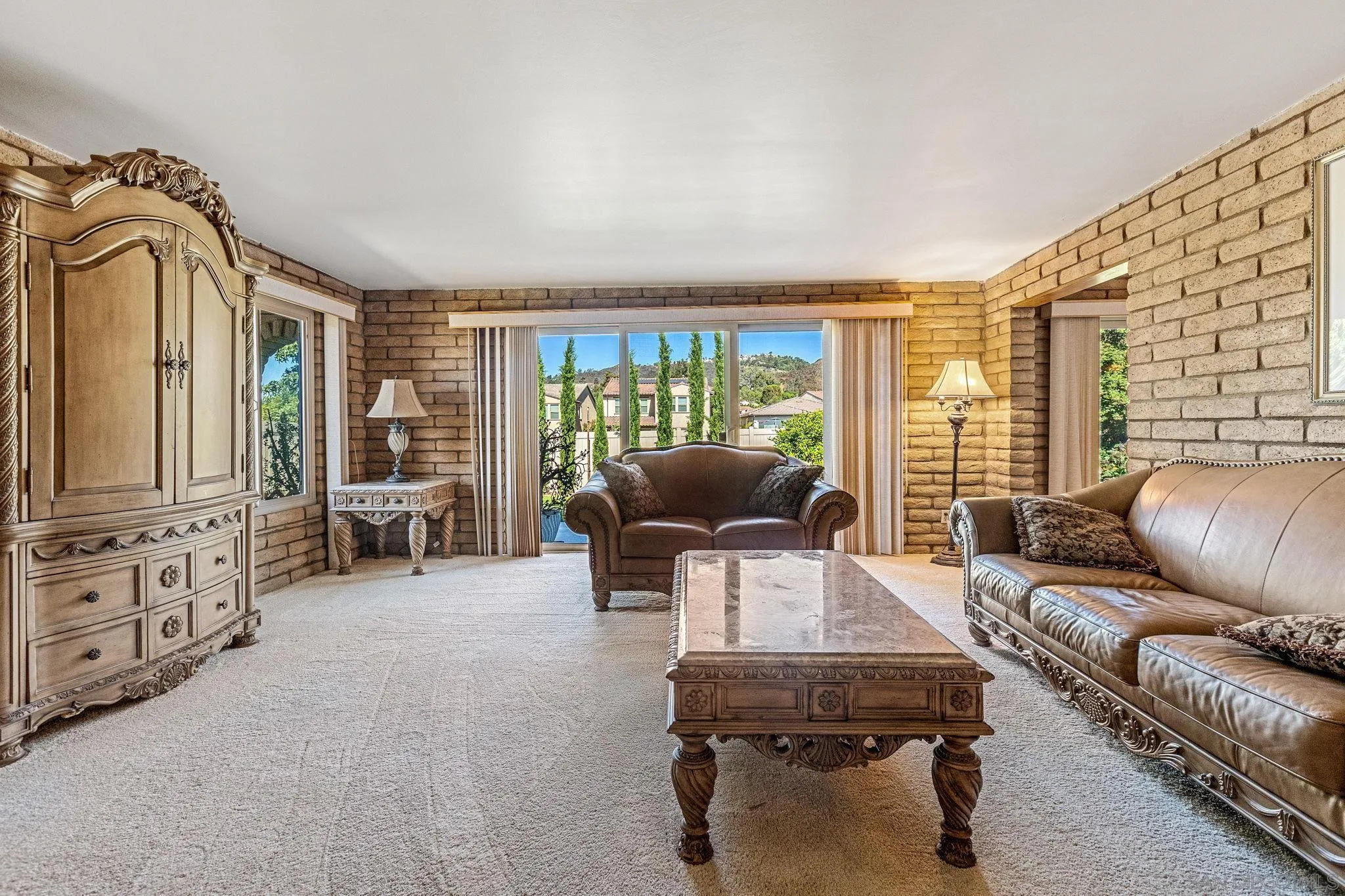 1983 David Drive Escondido, CA 92026 - Photo 24 of 55 a living room with furniture and a flat screen tv