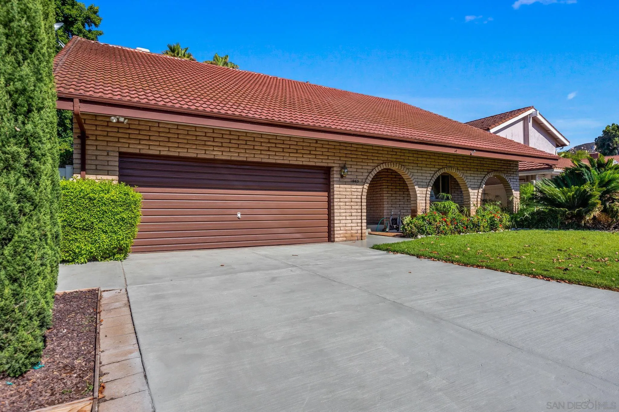 1983 David Drive Escondido, CA 92026 - Photo 3 of 55 a front view of a house with garden