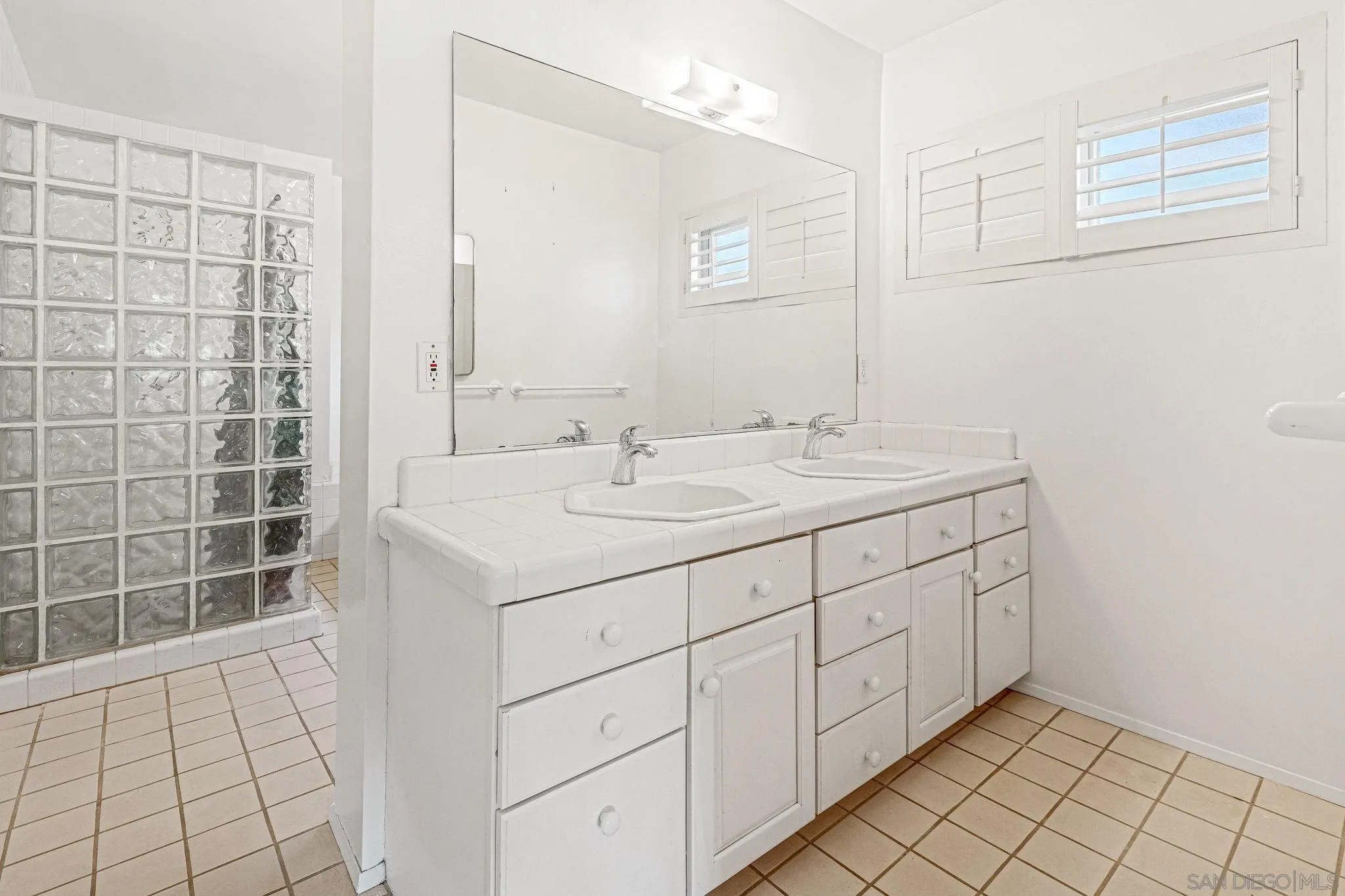 1983 David Drive Escondido, CA 92026 - Photo 33 of 55 a utility room with cabinets
