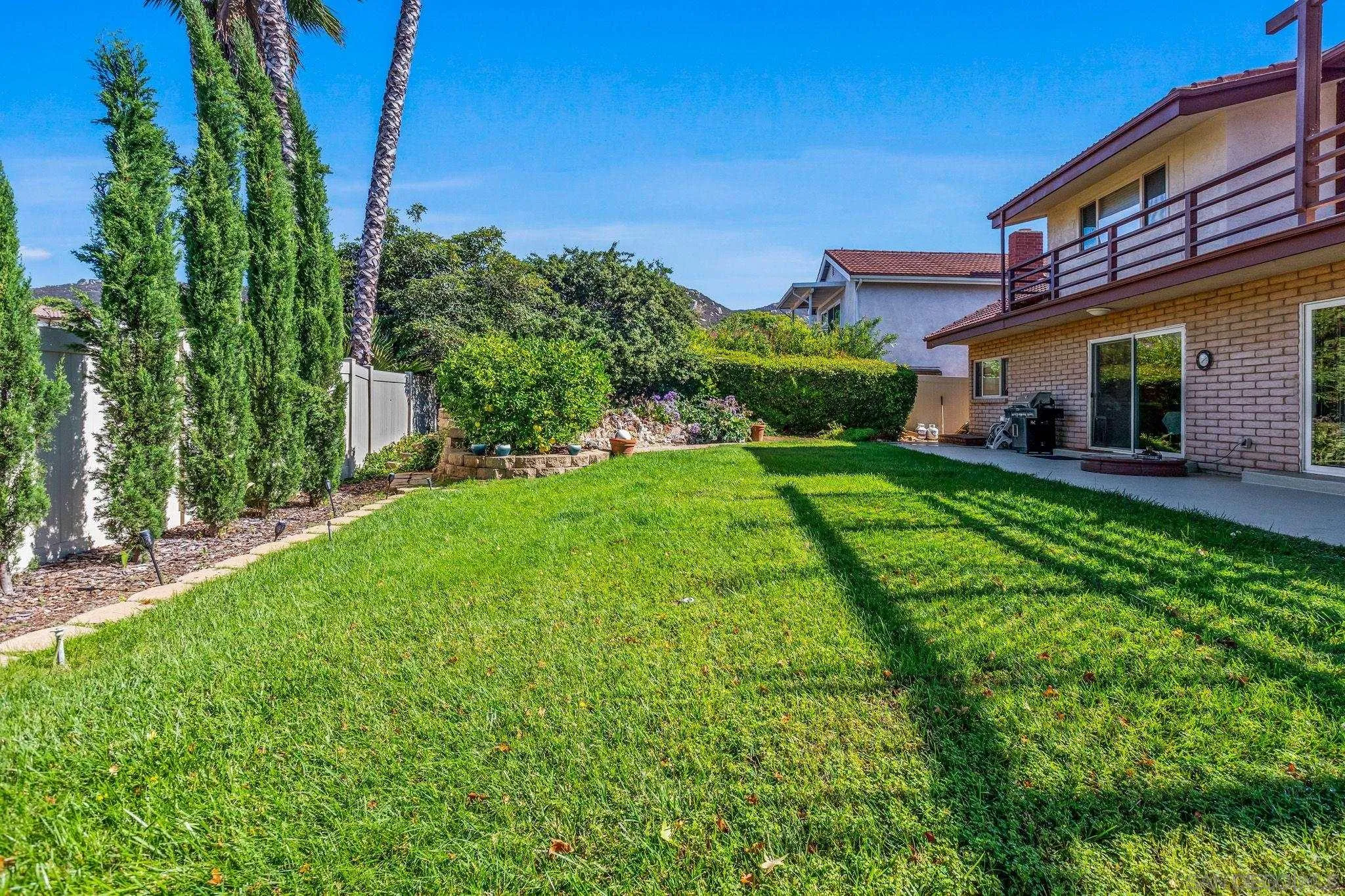 1983 David Drive Escondido, CA 92026 - Photo 39 of 55 a view of a house with a yard porch and sitting area