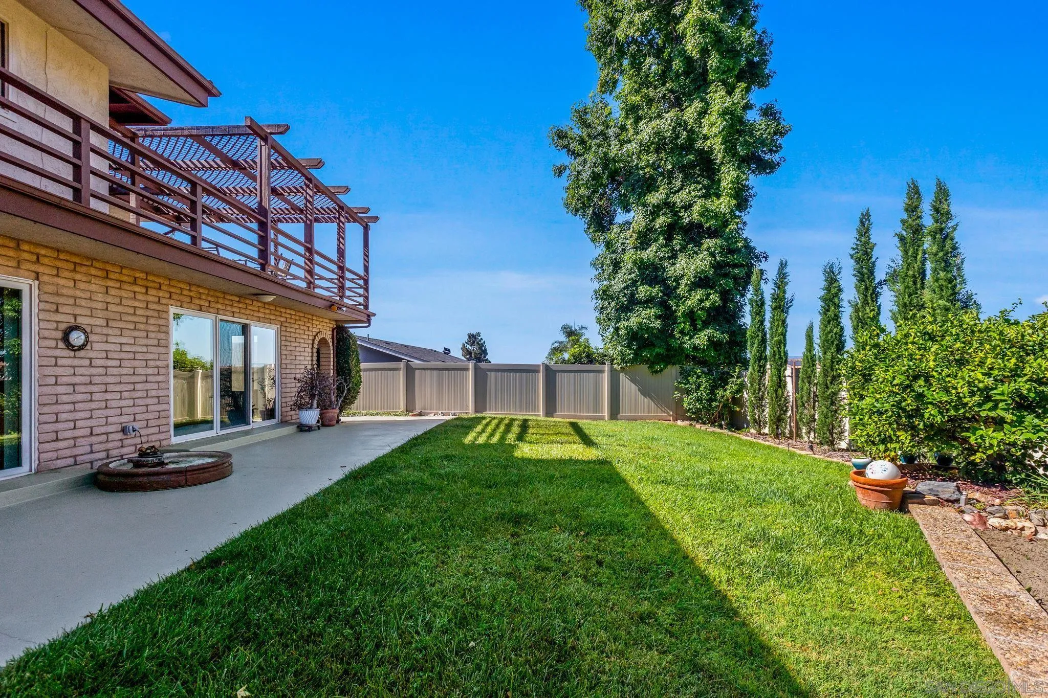 1983 David Drive Escondido, CA 92026 - Photo 42 of 55 a backyard of a house with lots of green space