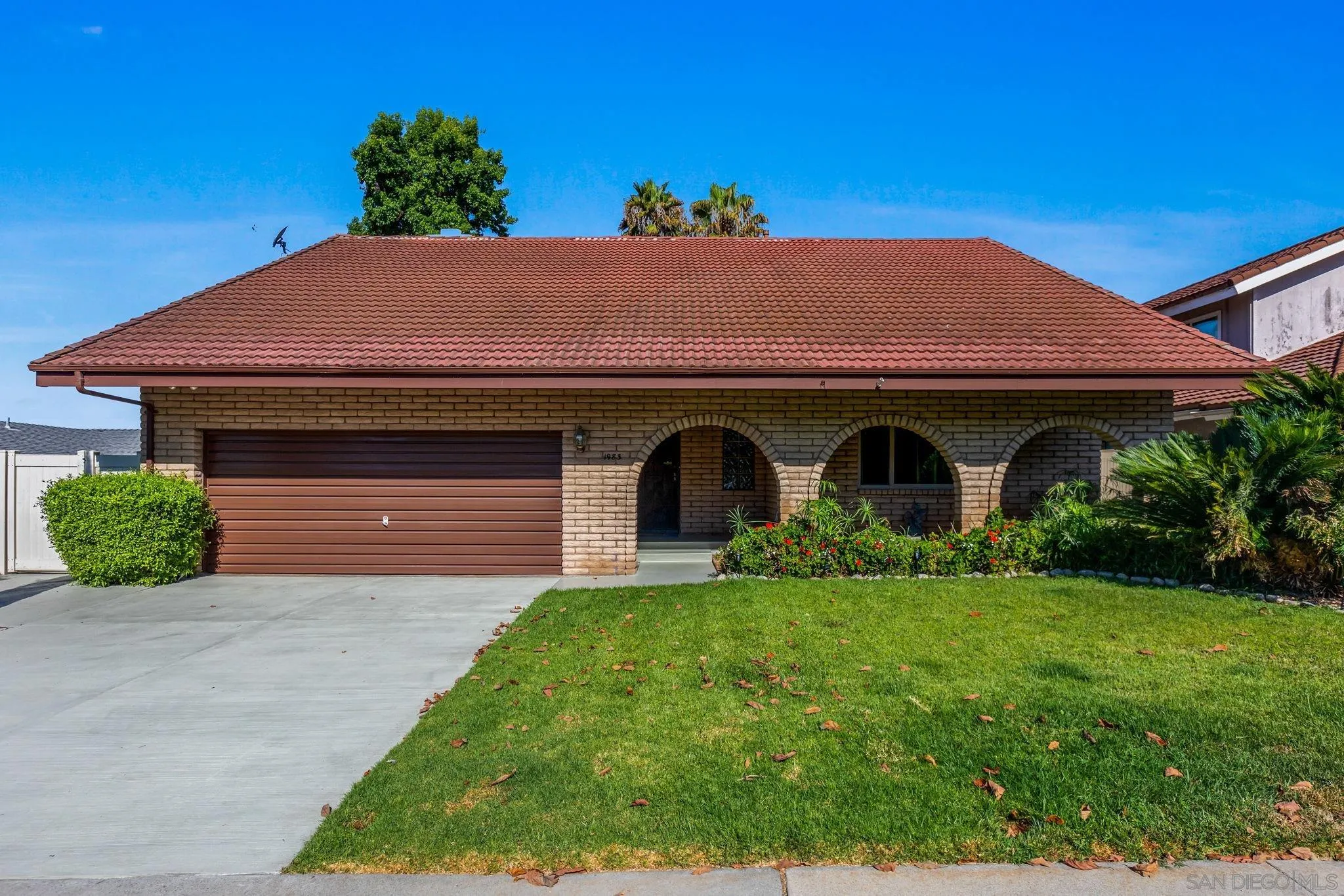 1983 David Drive Escondido, CA 92026 - Photo 7 of 55 a front view of a house with garden