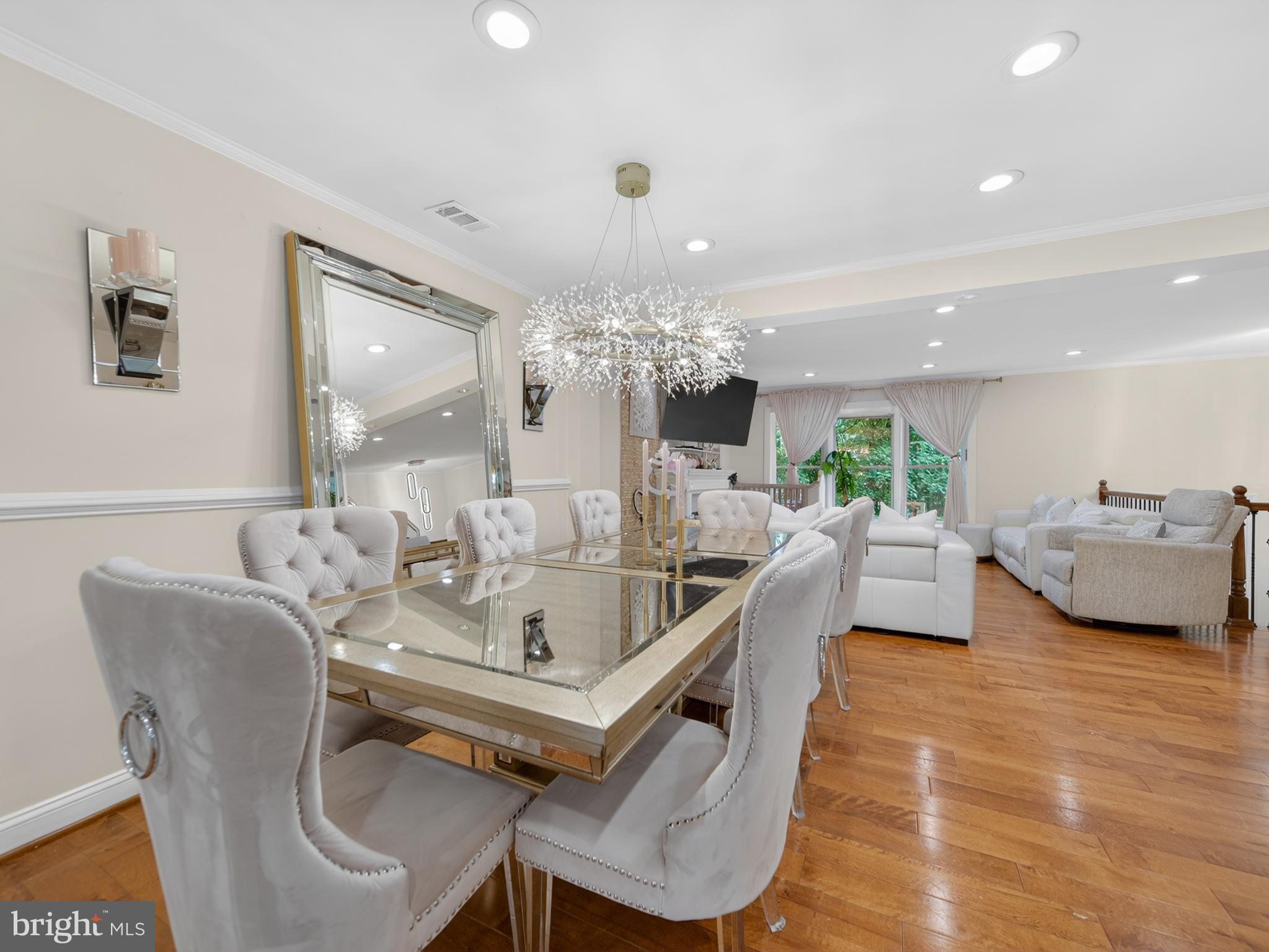 13427 Delaney Road Woodbridge, VA 22193 - Photo 17 of 57 a view of a dining room with furniture and wooden floor