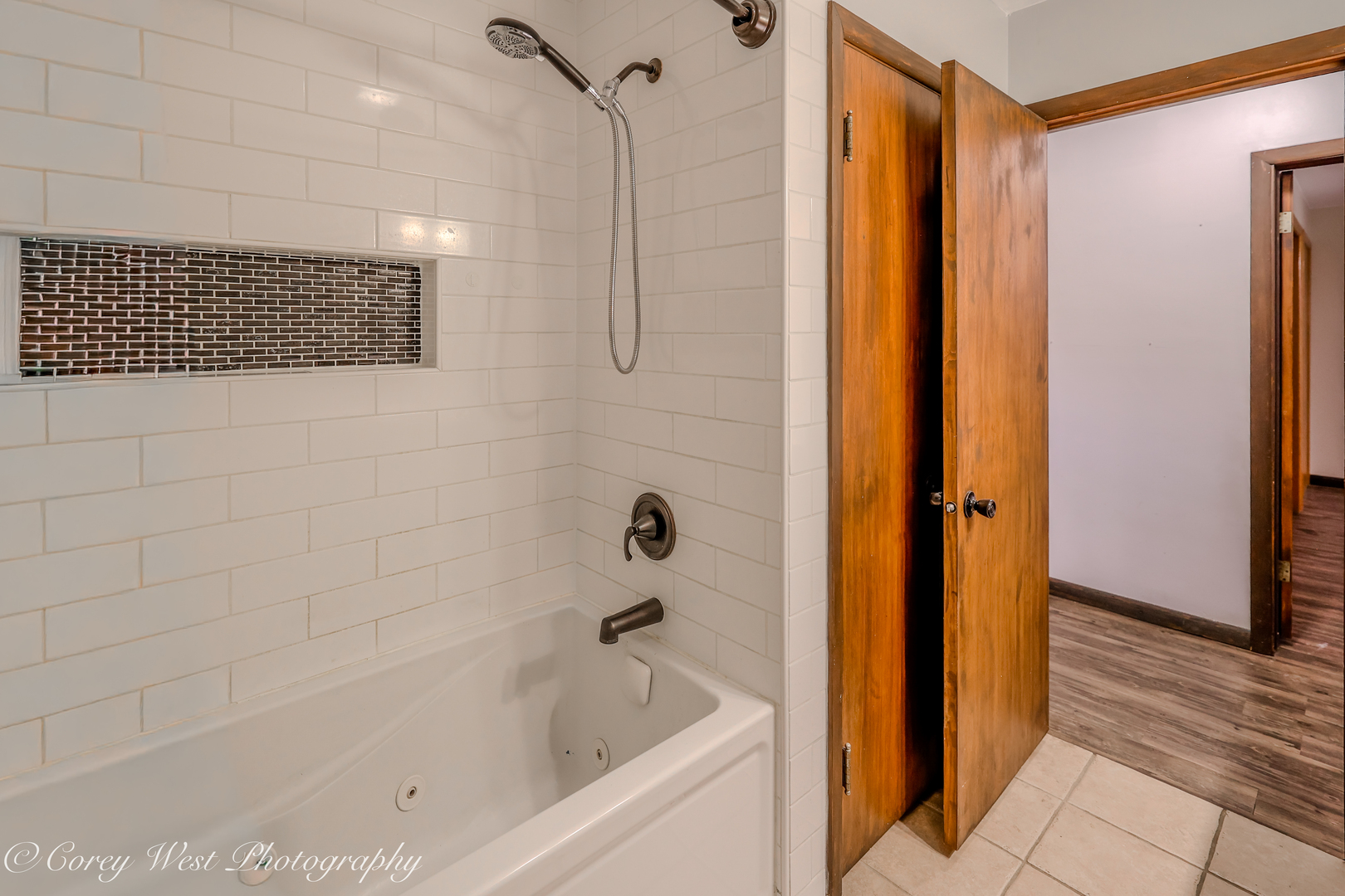 8994 Highway 64 Sycamore, IL 60178 - Photo 15 of 37 a bathroom with a bathtub and shower