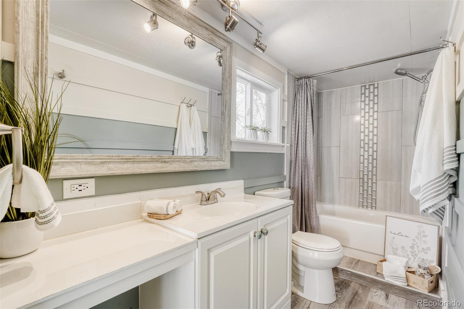 210 Pinto Street Golden, CO 80401 - Photo 18 of 35 a bathroom with a sink a toilet and shower