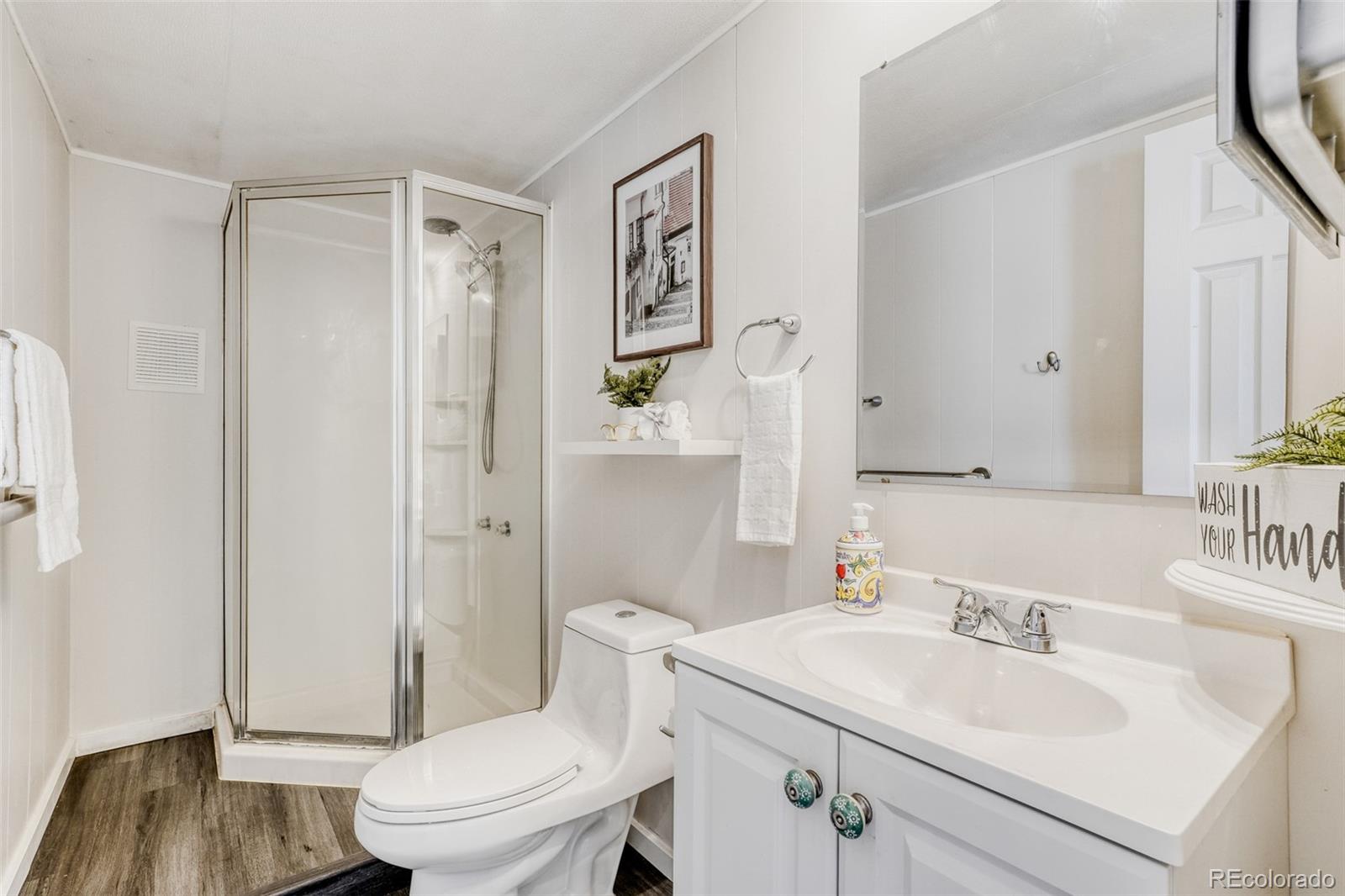 210 Pinto Street Golden, CO 80401 - Photo 22 of 35 a bathroom with a sink a toilet and shower