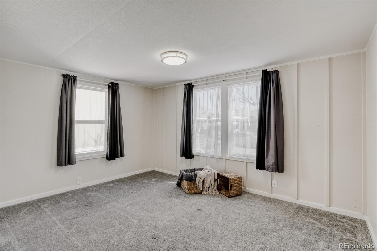 210 Pinto Street Golden, CO 80401 - Photo 23 of 35 an empty room with windows