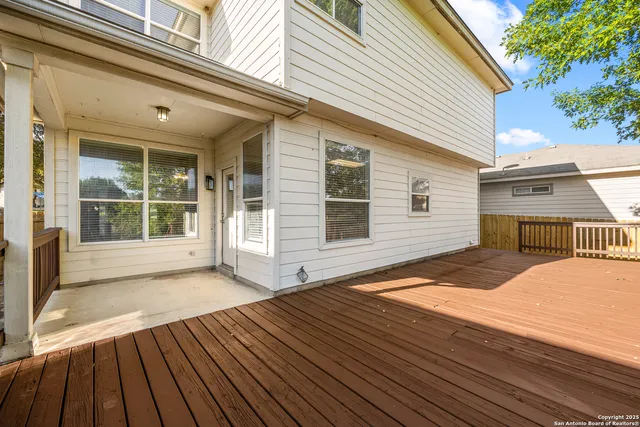 a view of a house with a roof deck