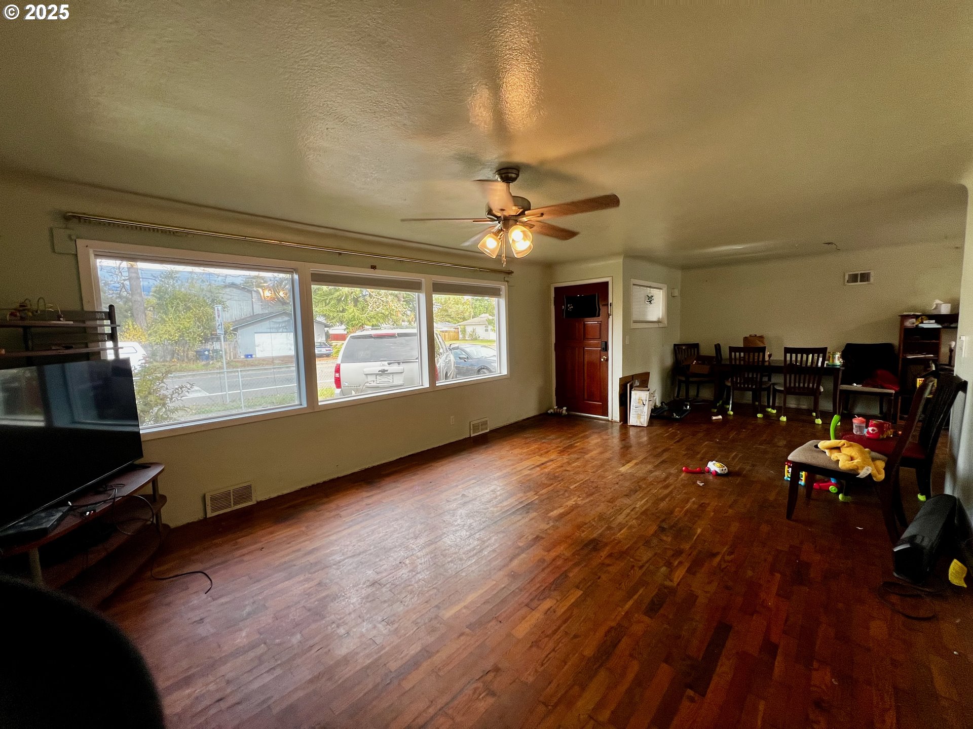 1271 Centennial Boulevard Springfield, OR 97477 - Photo 3 of 10 a living room with furniture and a large window