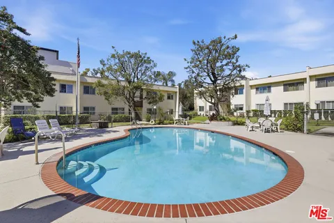 a view of outdoor space yard swimming pool and seating