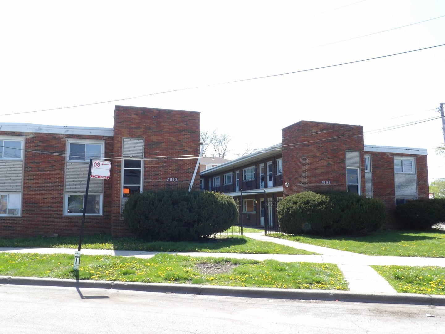 7806 South Troy Street, Unit 18 Chicago, IL 60652 - Photo 1 of 1 a brick house with a yard