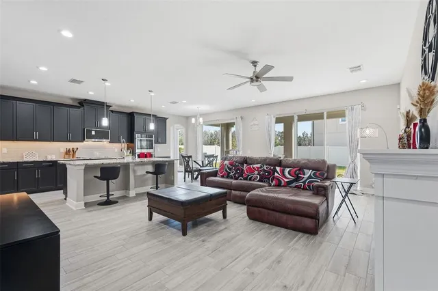 a view of a dining room with furniture window and outside view