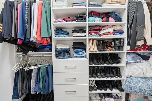 a bathroom with a sink toilet and a mirror