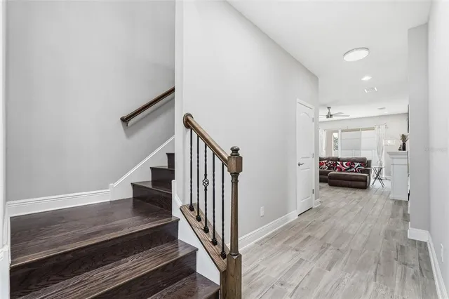 a bathroom with a sink toilet and a mirror
