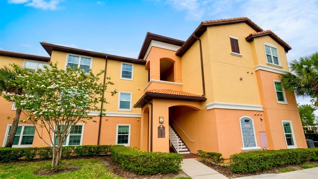 5483 Vineland Road, Unit 10301 Orlando, FL 32811 - Photo 1 of 13 front view of a house
