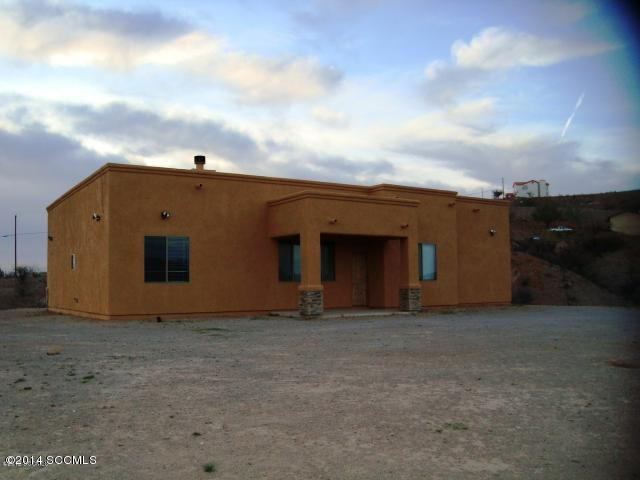 64 Camino Pesqueira Rio Rico, AZ 85648 - Photo 9 of 10 a view of a house with a yard