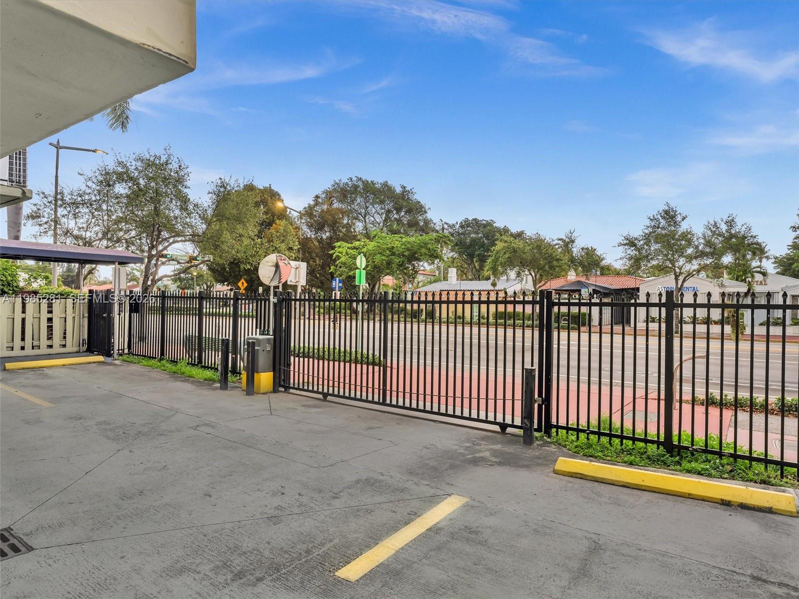 1236 Alton Road, Unit 304 Miami Beach, FL 33139 - Photo 22 of 28 a view of a park with iron fence