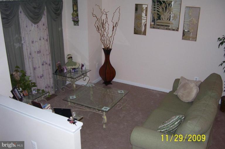 7020 Commander Howe Terrace Brandywine, MD 20613 - Photo 22 of 29 Living Room