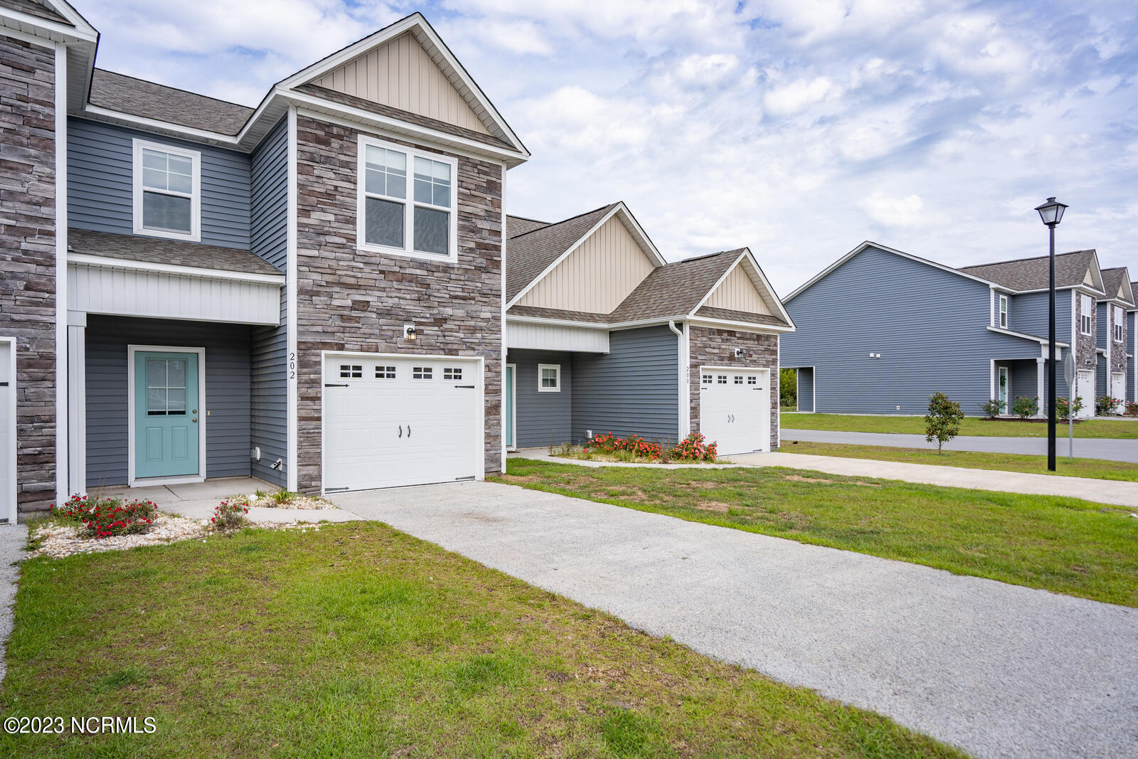 202 North Stingray Lane Holly Ridge, NC 28445 - Photo 1 of 34 Front of Property - 2nd In