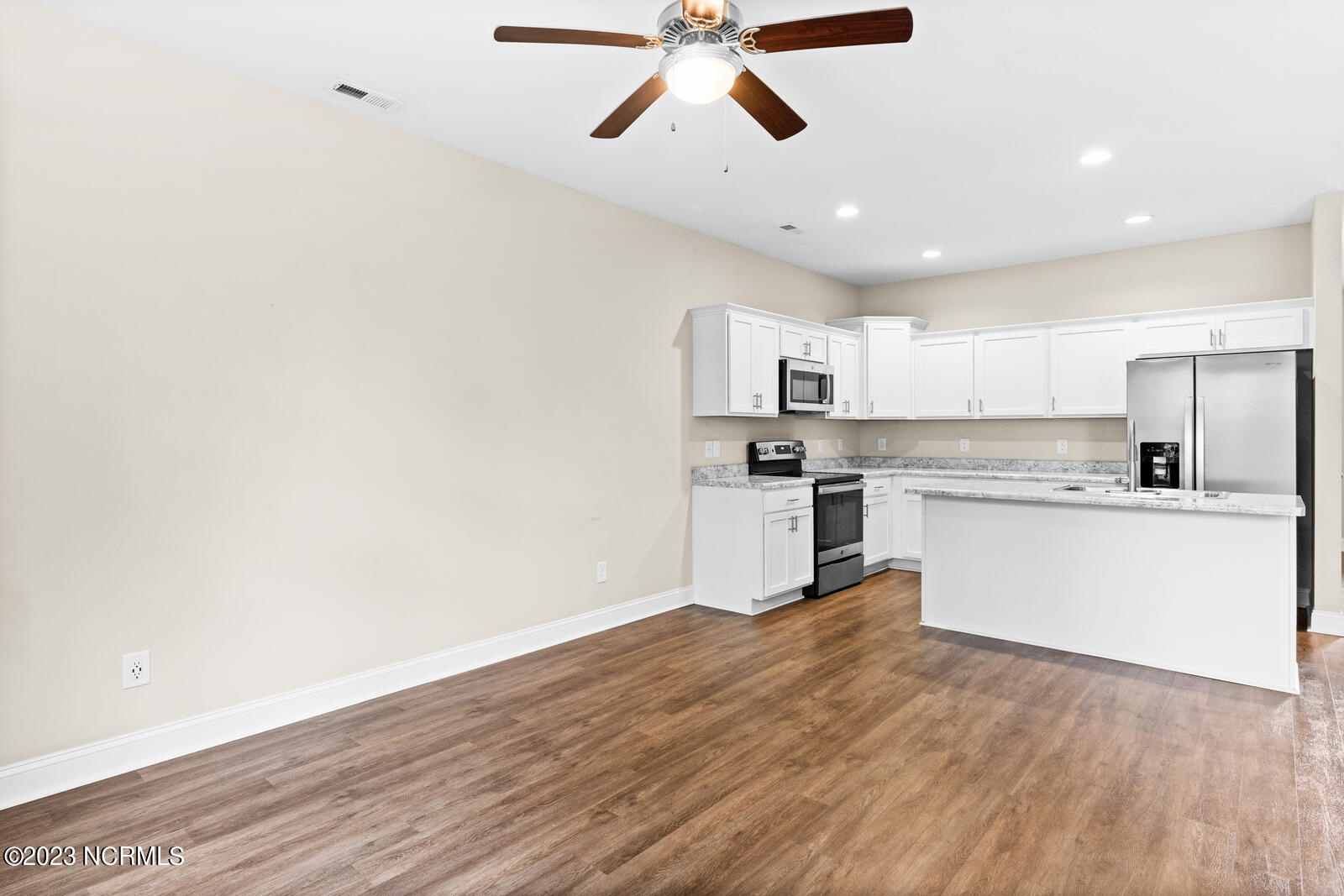 202 North Stingray Lane Holly Ridge, NC 28445 - Photo 10 of 34 Living Room to Kitchen