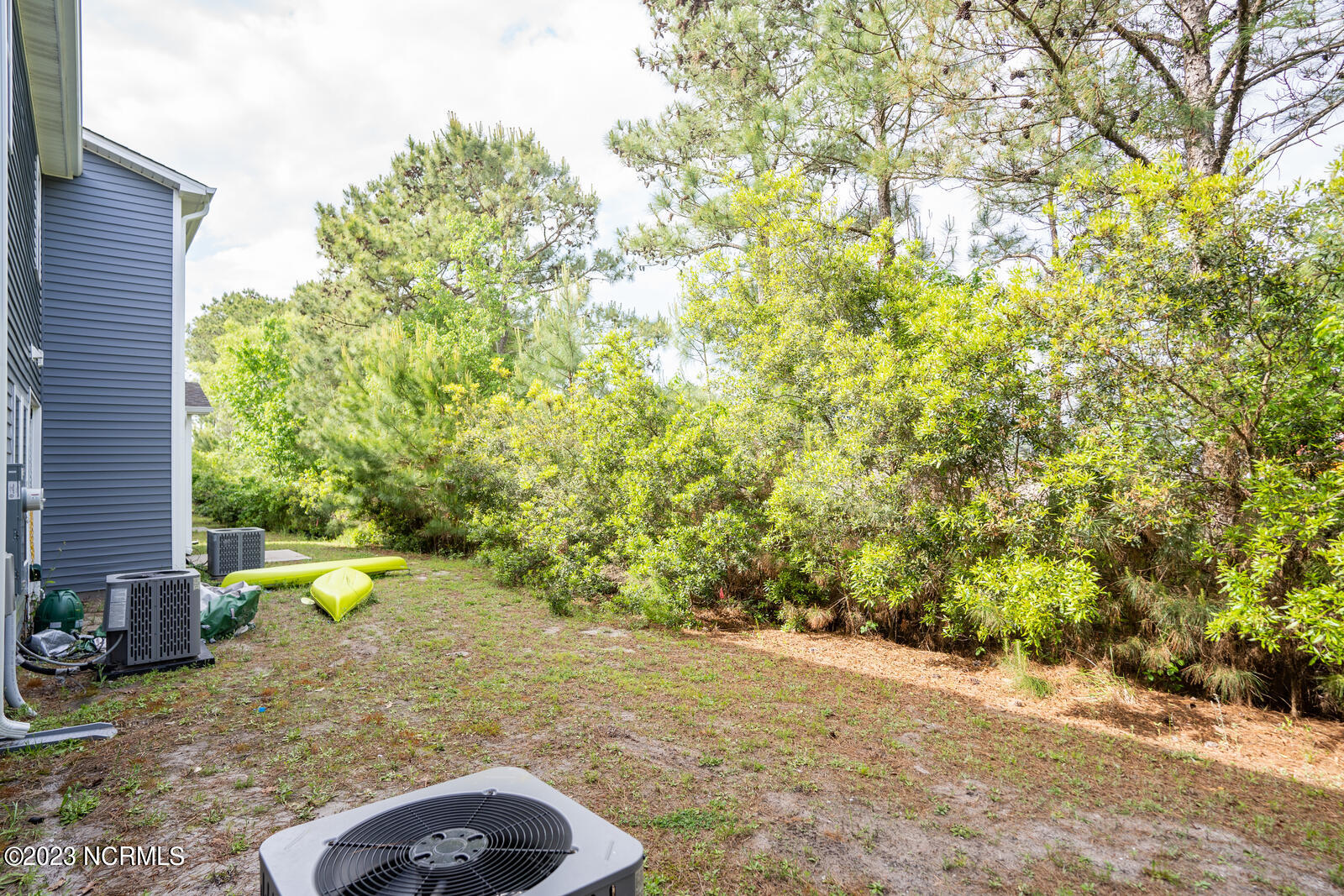 202 North Stingray Lane Holly Ridge, NC 28445 - Photo 28 of 34 Space Behind Back Patio