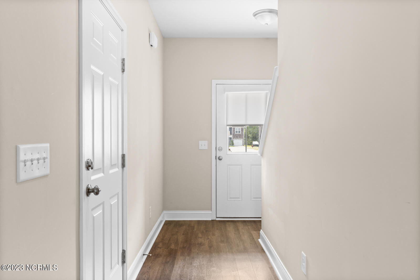 202 North Stingray Lane Holly Ridge, NC 28445 - Photo 3 of 34 Entry from Garage & Front Door