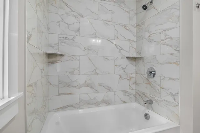 a bathroom with a bathtub