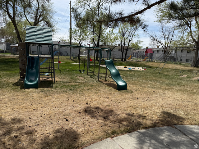 747 Hanover Drive Orem, UT 84058 - Photo 26 of 30 View of playground featuring a lawn