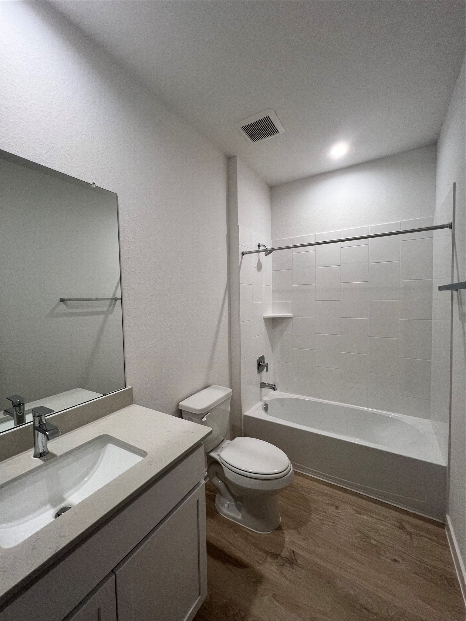 3811 Winterbourne Way Fulshear, TX 77441 - Photo 15 of 22 a bathroom with a sink a toilet and shower