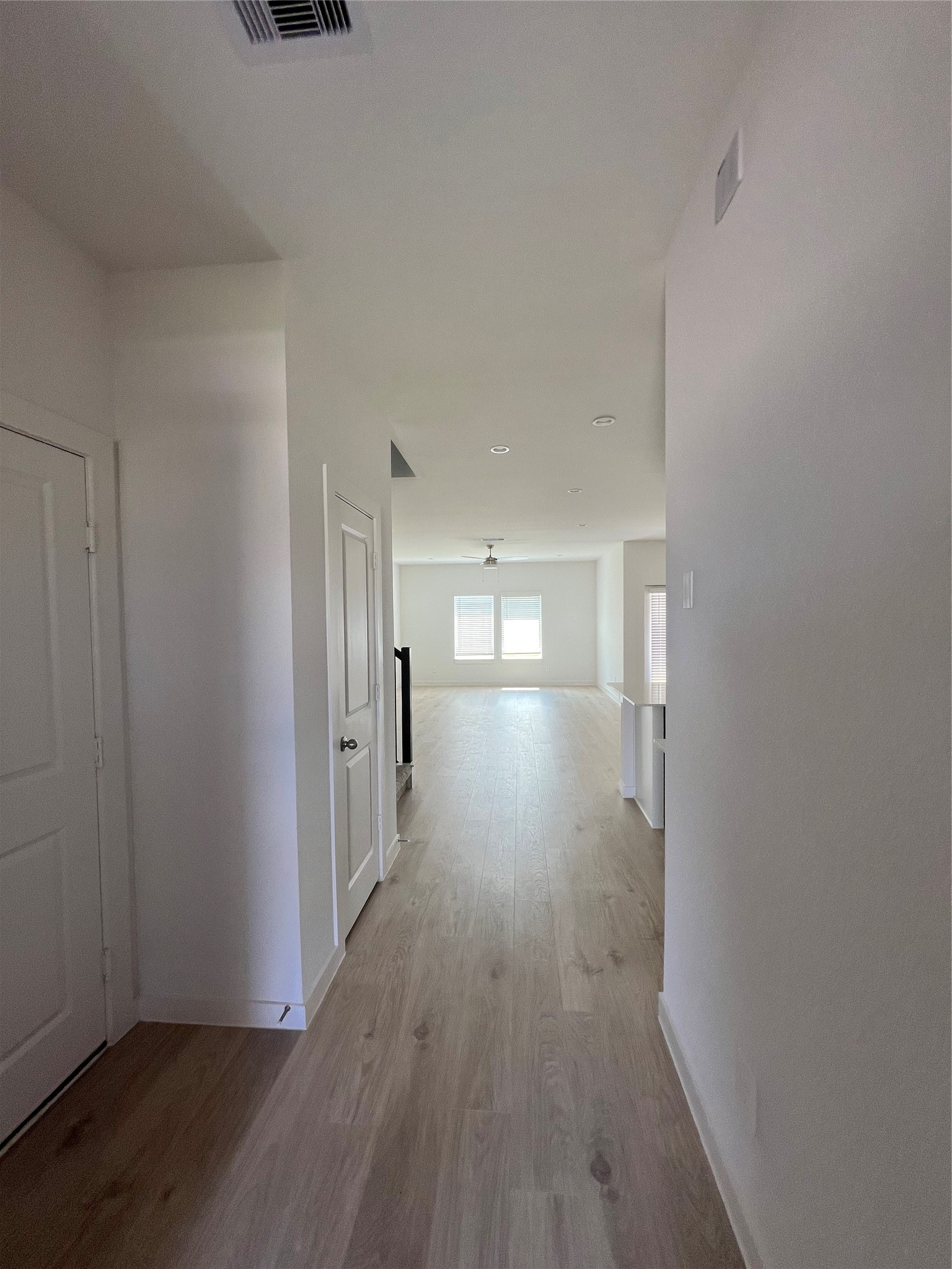 3811 Winterbourne Way Fulshear, TX 77441 - Photo 3 of 22 a view of hallway with wooden floor